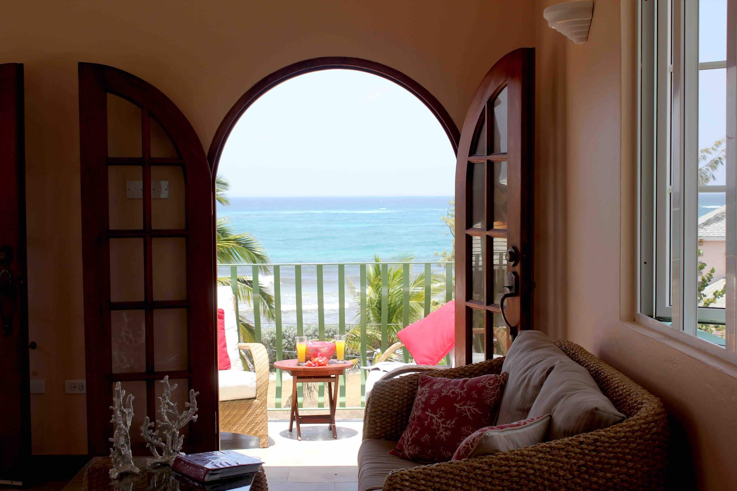 The Atlantic framed by Sea Mist Upper's open wooden doors
